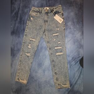 Distressed Blue Jeans